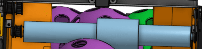 CAD render of the intake roller spanning the robot, with a larger-radius section in the middle and balls behind it